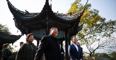 French President Emmanuel Macron (2nd R), his wife Brigitte Macron (R), Chinese President Xi Jinping (2nd L) and his wife Peng Liyuan (L) visit the Dujiangyan site, a designated UNESCO World Heritage site, Dujiangyan, China, Dec. 5, 2025. (AFP Photo)