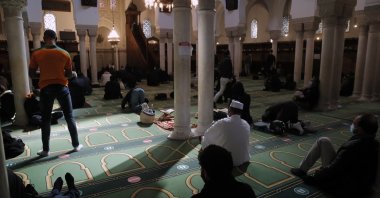 Muslims pray during the first day of the holy fasting month of Ramadan, at the Paris Mosque, Tuesday, April 13, 2021. (AP File Photo)