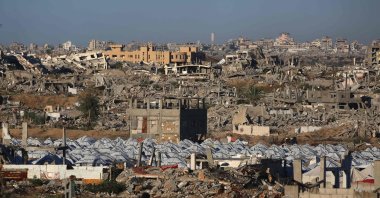 A camp amid the rubble of destroyed buildings in the Nuseirat camp for displaced Palestinians in the central Gaza Strip, Dec. 2, 2025. (AFP Photo)