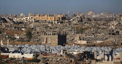 A camp amid the rubble of destroyed buildings in the Nuseirat camp for displaced Palestinians in the central Gaza Strip, Dec. 2, 2025. (AFP Photo)