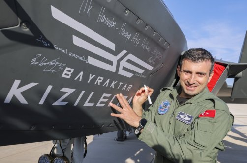 Baykar Chair of the Board Selçuk Bayraktar poses beside the company&#039;s Kızılelma unmanned fighter jet, Amasya, northern Türkiye, Nov. 29, 2025. (AA Photo)