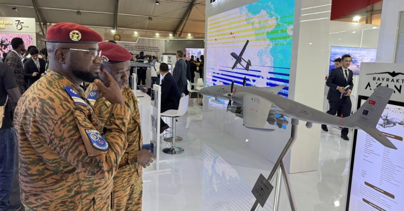 Visitors inspect mockups of unmanned aerial vehicles of Turkish drone magnate Baykar at the BAMEX&#039;25 Defense Expo, Bamako, Mali, Nov. 11, 2025. (AA Photo)
