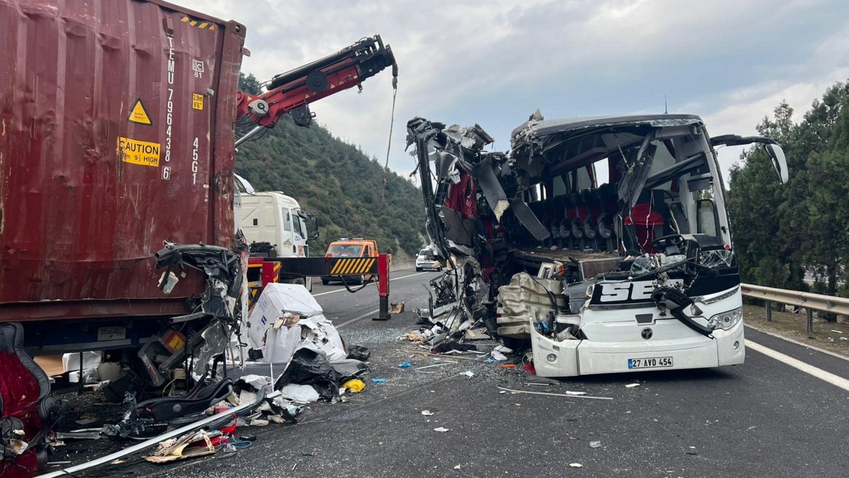 Emergency crews work at the scene after a passenger bus crashed into a lorry near Bahçe district in southern Osmaniye province, Türkiye, Dec. 6, 2025. (AA Photo)