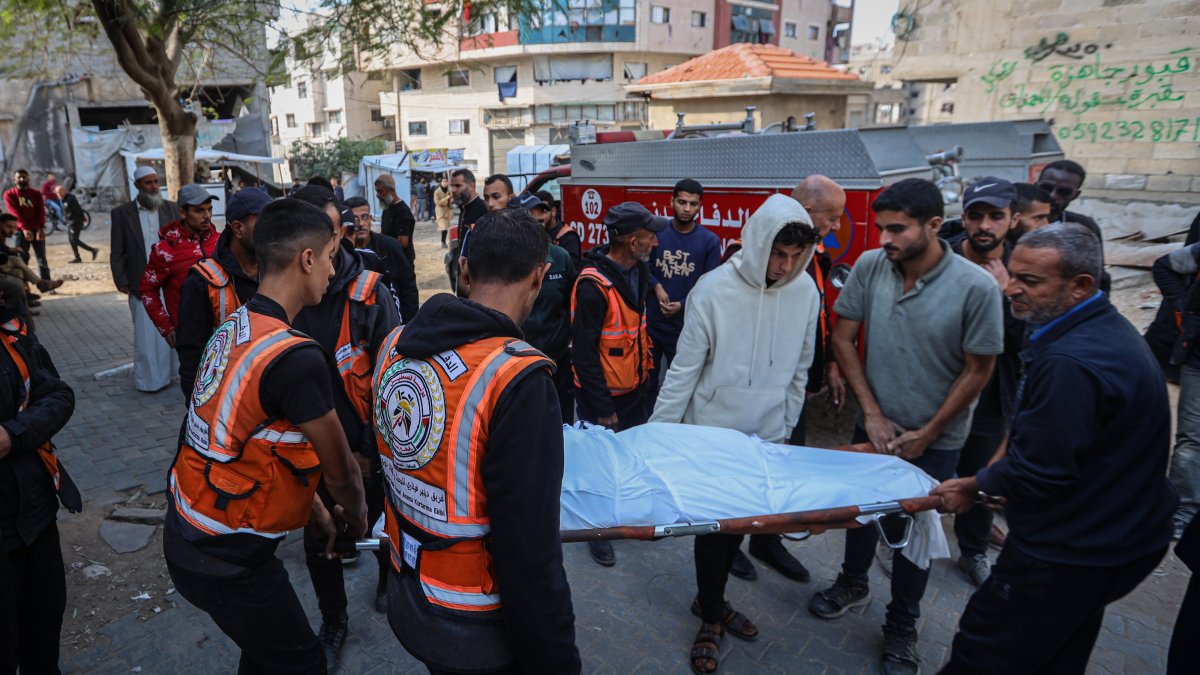 Bodies of three Palestinians, including a civil defense worker, are brought to al-Shifa Hospital after an Israeli drone strike hit the Atatara area of Beit Lahiya in northern Gaza, Dec. 6, 2025. (AA Photo)