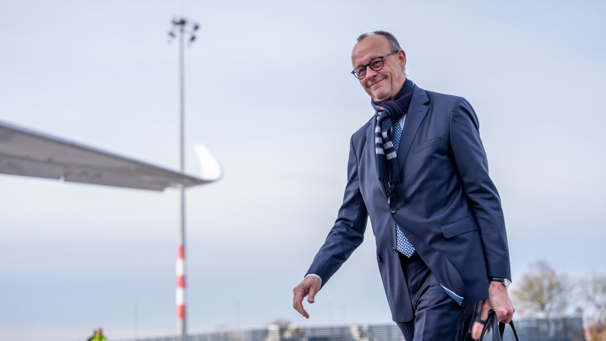 German Chancellor Friedrich Merz arrives at Berlin&#039;s Brandenburg Airport in Schönefeld, Germany, Dec. 6, 2025. (AP Photo)