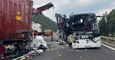 Emergency crews work at the scene after a passenger bus crashed into a lorry near Bahçe district in southern Osmaniye province, Türkiye, Dec. 6, 2025. (AA Photo)