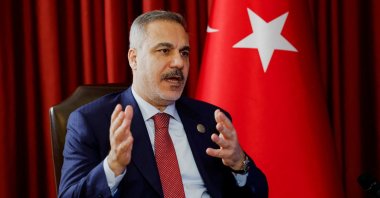 Foreign Minister Hakan Fidan speaks during an interview with Reuters at the 23rd edition of the annual Doha Forum, in Doha, Qatar, Dec. 6, 2025. (Reuters Photo)