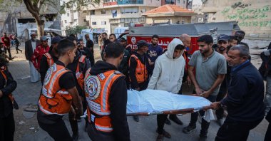 Bodies of three Palestinians, including a civil defense worker, are brought to al-Shifa Hospital after an Israeli drone strike hit the Atatara area of Beit Lahiya in northern Gaza, Dec. 6, 2025. (AA Photo)