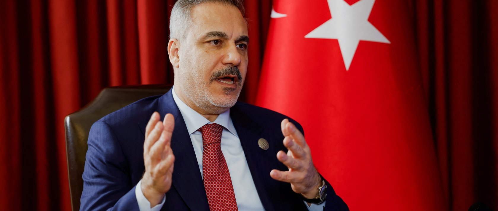 Foreign Minister Hakan Fidan speaks during an interview with Reuters at the 23rd edition of the annual Doha Forum, in Doha, Qatar, Dec. 6, 2025. (Reuters Photo)