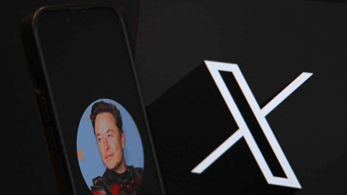 This illustration photograph shows the logo of social network X (formerly Twitter) and a photograph of Elon Musk displayed on a smartphone, Brussels, Belgium, Sept. 27, 2024. (AFP Photo)