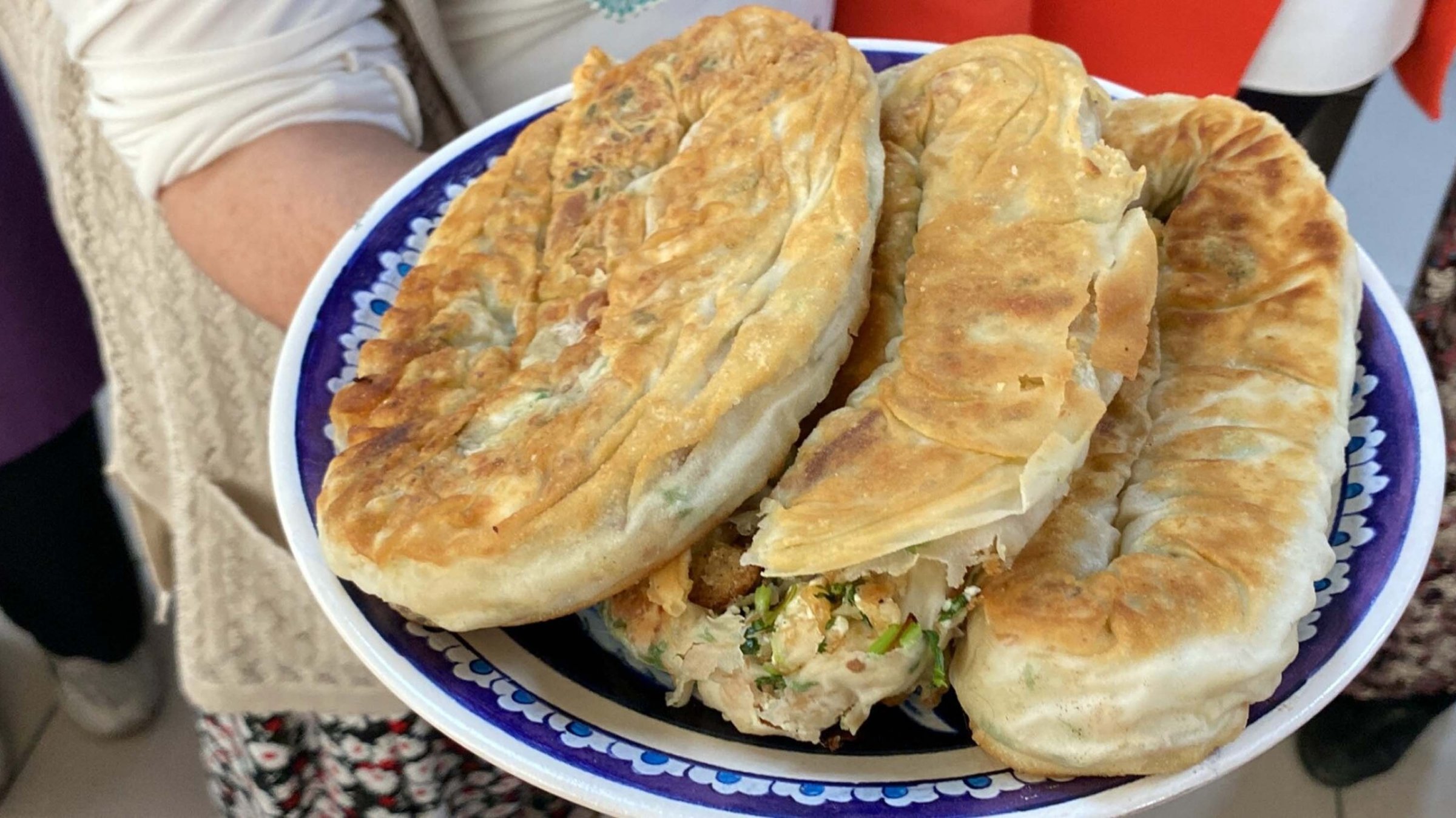 A traditional village pastry is prepared during a documentation session, Izmir, Türkiye, Dec. 7, 2025. (DHA Photo)