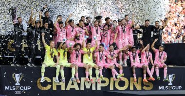 Inter Miami players and technical team celebrate with the MLS Trophy after winning the 2025 MLS Cup Final against Vancouver Whitecaps FC, in Fort Lauderdale, Florida, U.S., Dec. 6, 2025. (EPA Photo)