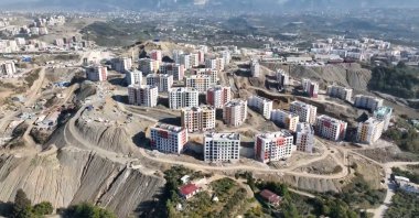 An aerial view showing the ongoing construction of 6,737 disaster-relief homes and 15 commercial centers built after the Feb. 6 earthquakes, Hatay, Türkiye, Nov. 20, 2025. (AA Photo)