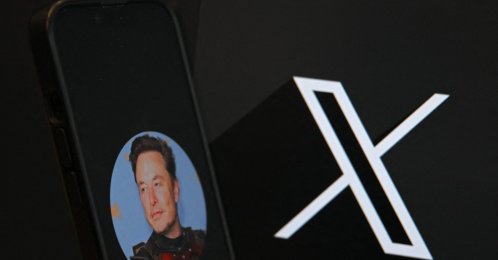 This illustration photograph shows the logo of social network X (formerly Twitter) and a photograph of Elon Musk displayed on a smartphone, Brussels, Belgium, Sept. 27, 2024. (AFP Photo)