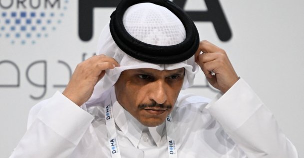Qatar&#039;s Prime Minister and Minister for Foreign Affairs Sheikh Mohammed bin Abdulrahman bin Jassim Al-Thani, adjusts his agal as he attends a session on the opening day of the Doha Forum, an annual diplomatic conference, in Doha, Qatar, Dec. 6, 2025. (AFP Photo)