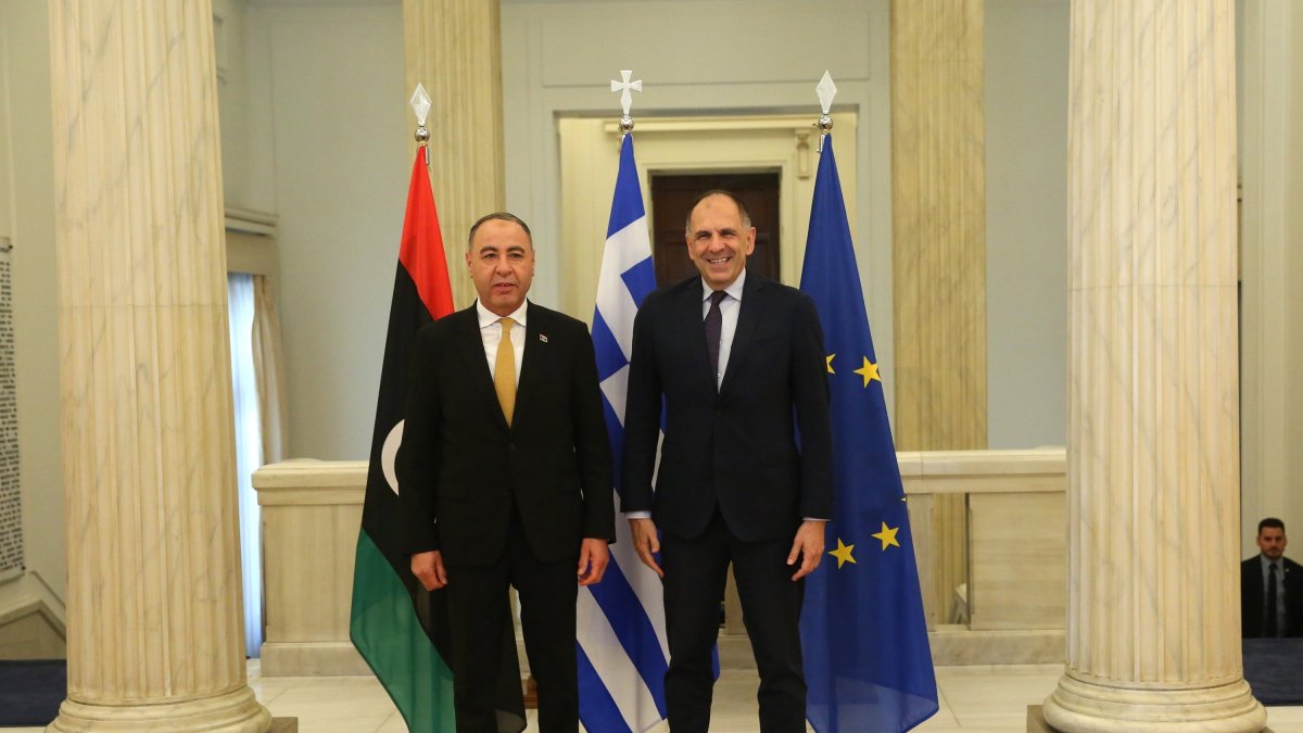 Greek Foreign Minister Giorgos Gerapetritis (R) welcomes his Libyan counterpart Taher Salem Al Baour (L) during their meeting, Athens, Greece, Sept. 17, 2025. (EPA Photo)