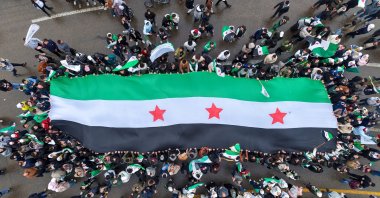 People gather to celebrate a year since the ousting of longtime regime dictator Bashar Assad, Damascus, Syria, Dec. 8, 2025. (AA Photo)