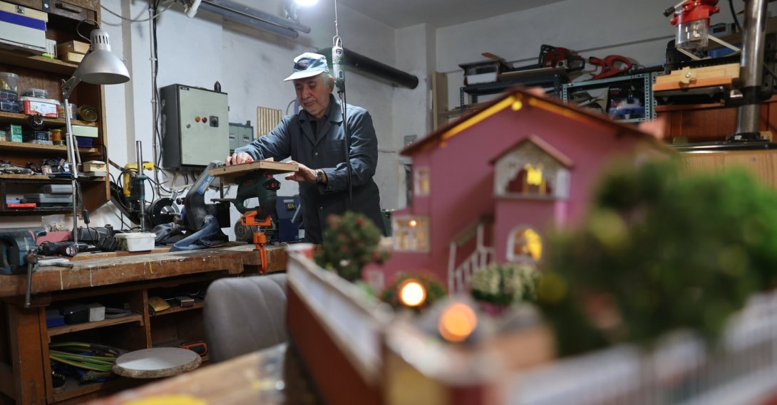 Miniature models and wooden decor crafted from recycled materials displayed in Mehmet Demir’s home, Nevşehir, Türkiye, Dec. 8, 2025. (AA Photo)
