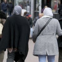 Women with headscarves are walking in a pedestrian zone in Vienna, Austria, April 21, 2017. (AP File Photo)