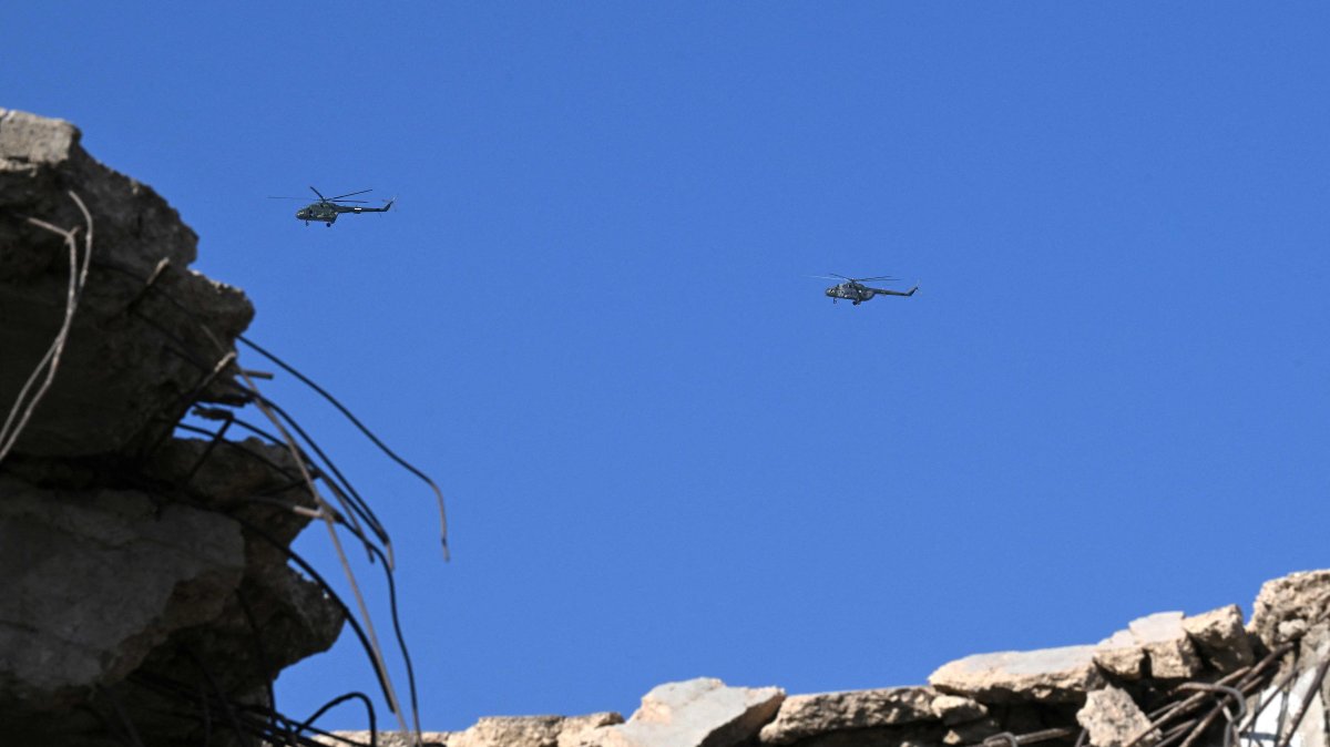 Syrian army helicopters hover over Darayya near Mezzeh Airport in Damascus, Nov. 10, 2025. (AFP Photo)