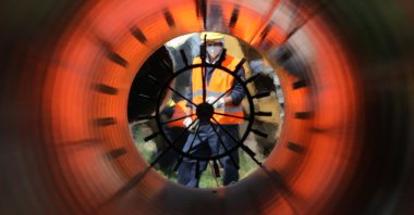 Workers are seen through a pipe at a construction site on the extension of Russia&#039;s TurkStream gas pipeline, Letnitsa, Bulgaria, June 1, 2020. (Reuters Photo)
