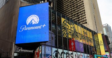 A Paramount  advertisement is displayed on the building where Paramount Global&#039;s office is located in Times Square, New York City, U.S., Dec. 8, 2025. (Reuters Photo)