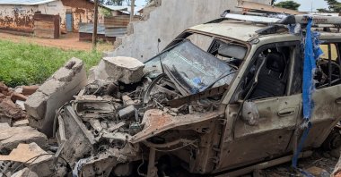 A general view of a car destroyed by shelling during intense fighting, Kamnyola, DRC, Dec. 7, 2025. (AFP Photo)