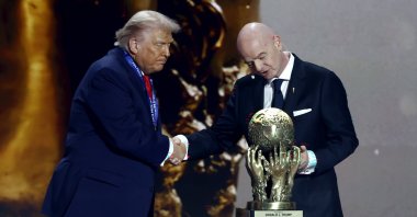 U.S. President Donald Trump receives the FIFA Peace Prize from FIFA President Giovanni Infantino during the FIFA World Cup 2026 Final Draw at the Kennedy Center in Washington D.C., Dec. 5, 2025. (EPA Photo)