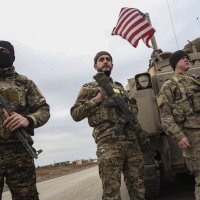 Militants of the U.S.-backed PKK/YPG terrorist group take up positions in the town of Dhiban, Deir el-Zour province, eastern Syria, Sept. 9, 2023. (EPA File Photo)