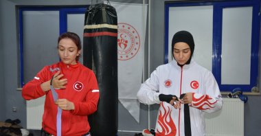 Gamze Korkmaz (L) and her sister Özlem Melek Korkmaz train in a bid to add new Muay Thai titles to their growing list of achievements, Bitlis, Türkiye, Dec. 9, 2025. (AA Photo)
