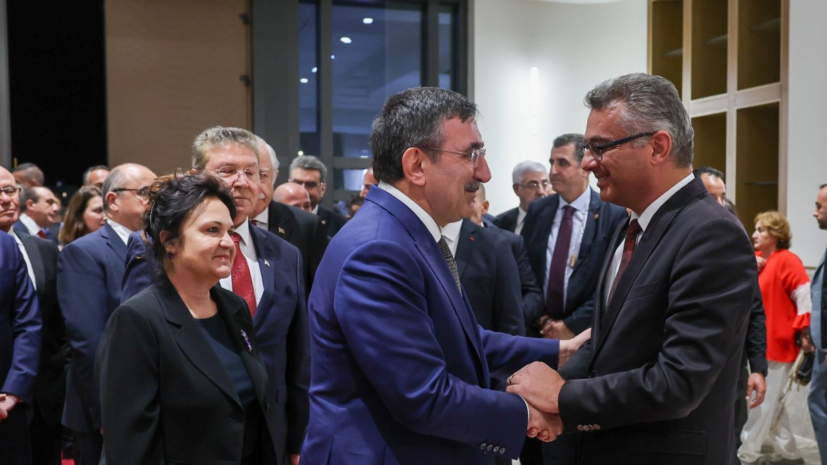 TRNC President Tufan Erhürman (R) shakes hands with Vice President Cevdet Yılmaz during an event, Lefkoşa (Nicosia), TRNC, Nov. 15, 2025. (AA Photo)
