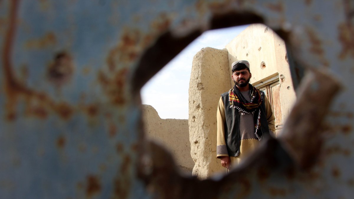 A man surveys a house that was allegedly damaged in cross-border firing, Spin Boldak, Afghanistan, Dec. 6, 2025. (EPA Photo)