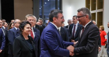 TRNC President Tufan Erhürman (R) shakes hands with Vice President Cevdet Yılmaz during an event, Lefkoşa (Nicosia), TRNC, Nov. 15, 2025. (AA Photo)