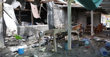  view of a damaged house after shelling by rockets fired by Cambodian armed forces during clashes between Thai and Cambodian troops, at a village in Phanom Dong Rak, Surin, Thailand, Dec. 11, 2025. (EPA Photo)