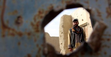 A man surveys a house that was allegedly damaged in cross-border firing, Spin Boldak, Afghanistan, Dec. 6, 2025. (EPA Photo)