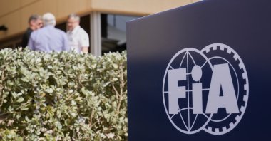 The FIA logo is displayed in the paddock ahead of the Formula One Bahrain Grand Prix at the Bahrain International Circuit, Sakhir, Bahrain, April 10, 2025. (AP Photo)