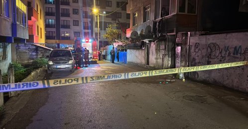 Firefighters conduct response and assessment work outside the burnt building, Pendik, Istanbul, Dec. 11, 2025. (AA Photo)