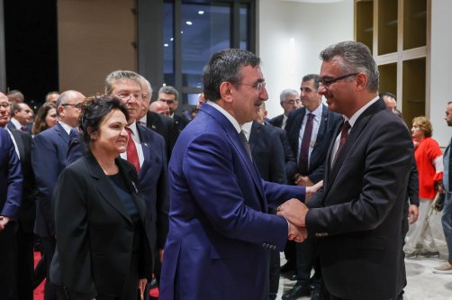 TRNC President Tufan Erhürman (R) shakes hands with Vice President Cevdet Yılmaz during an event, Lefkoşa (Nicosia), TRNC, Nov. 15, 2025. (AA Photo)
