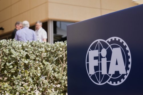 The FIA logo is displayed in the paddock ahead of the Formula One Bahrain Grand Prix at the Bahrain International Circuit, Sakhir, Bahrain, April 10, 2025. (AP Photo)