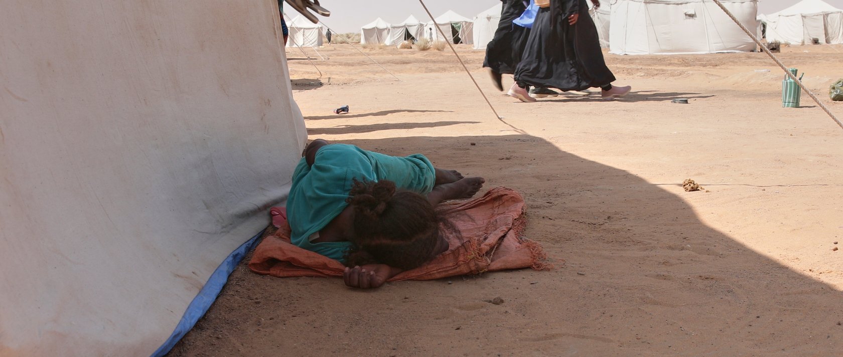 People displaced from North Darfur&#039;s capital, el-Fasher and other conflict-affected areas settle in the newly established El-Afadh camp in Al Dabbah, Northern State, Sudan, Nov. 13, 2025. (AP Photo)