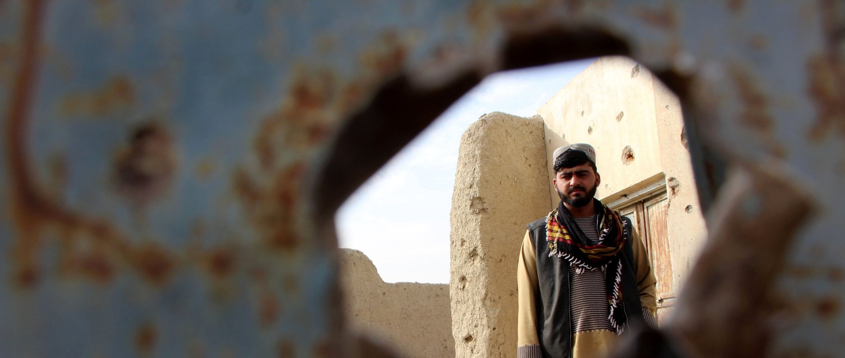 A man surveys a house that was allegedly damaged in cross-border firing, Spin Boldak, Afghanistan, Dec. 6, 2025. (EPA Photo)