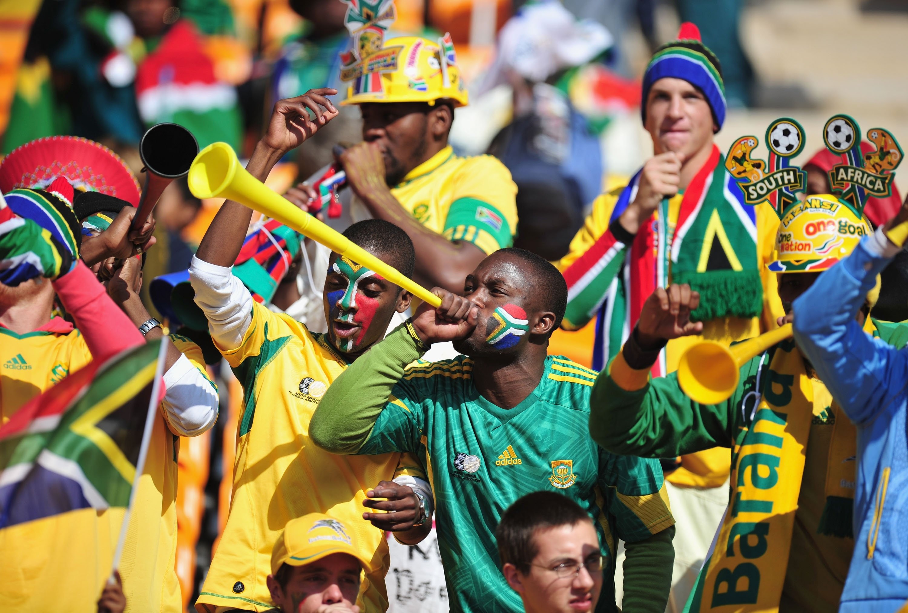 A South Africa fan blows a Vuvuzela as he awaits the Opening Ceremony ahead of the 2010 FIFA World Cup South Africa Group A match between South Africa and Mexico at Soccer City Stadium, Johannesburg, South Africa, June 11, 2010. (Getty Images Photo)