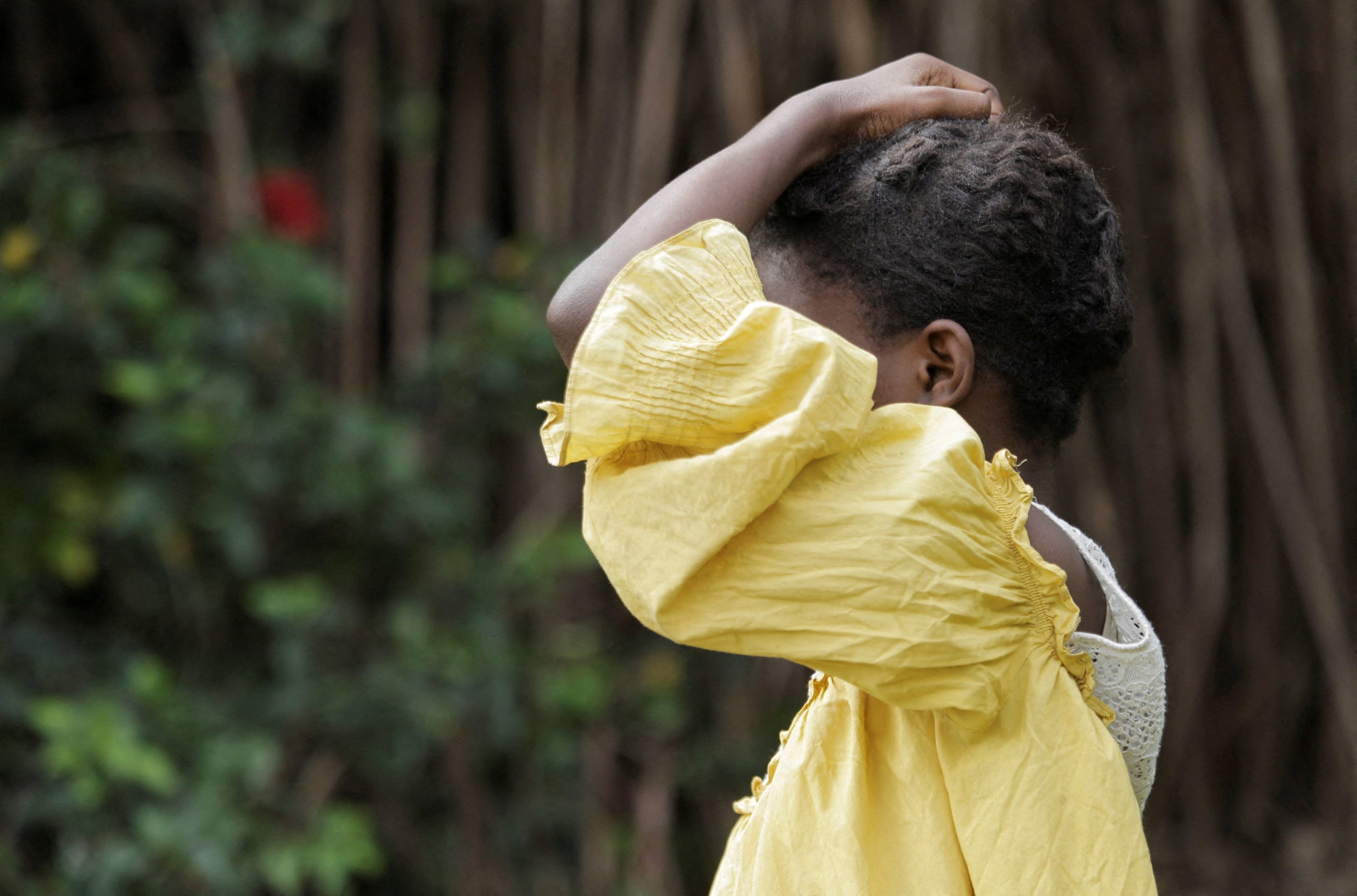 A rape victim, Asi, a 16-year-old girl, poses for a portrait, recounting her ordeal at the hands of M23 soldiers, Bujumbura, Burundi, May 25, 2025. (Reuters Photo)