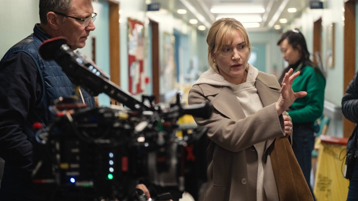 This image released by Netflix shows actor-director Kate Winslet (R) on the set of &quot;Goodbye June.&quot; (AP Photo)