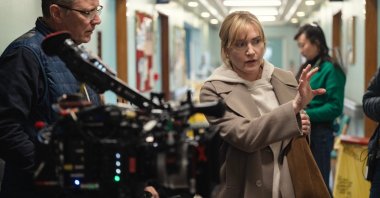 This image released by Netflix shows actor-director Kate Winslet (R) on the set of &quot;Goodbye June.&quot; (AP Photo)