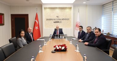 Labor and Social Security Minister Vedat Işıkhan (C) meets with officials from workers&#039; confederation Türk-Iş and employers&#039; confederation TISK before the first meeting of the Minimum Wage Determination Commission, Ankara, Türkiye, Dec. 12, 2025. (AA Photo)