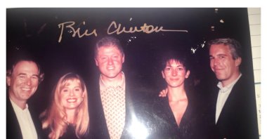 This undated photo released by Democrats on the House Oversight Committee shows former President Bill Clinton, Ghislaine Maxwell and Jeffrey Epstein, with Clinton&#039;s signature at the top of the photo. (House Oversight Committee via AP)