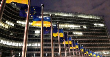  The European Union and Ukrainian flags flap in the wind to mark the third anniversary of Russia&#039;s full-scale invasion of Ukraine outside EU headquarters in Brussels, Feb. 24, 2025. (AP File Photo)