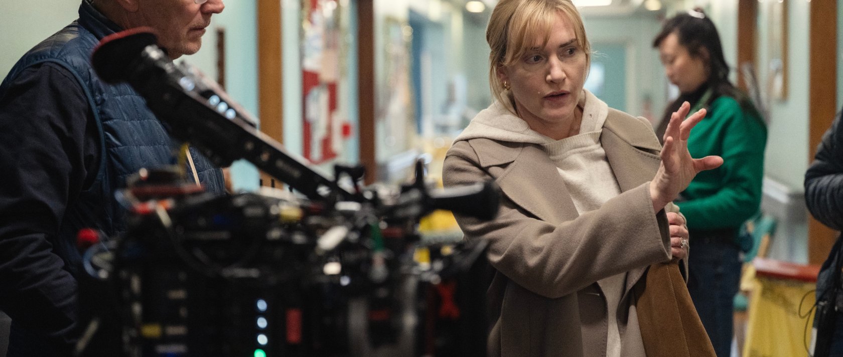 This image released by Netflix shows actor-director Kate Winslet (R) on the set of "Goodbye June." (AP Photo)