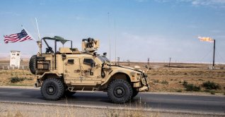 U.S. forces patrol oil fields in Syria, Oct. 28, 2019 . (AP Photo)